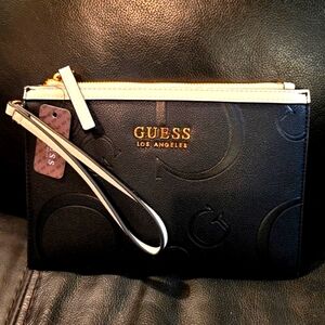 Brand new with tags beautiful leather Guess wristlet 9"×6"